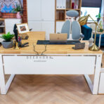 white desk with accessories on the top