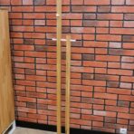 white wooden office coat rack