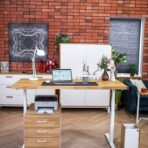 adjustable desk with printer pedestal