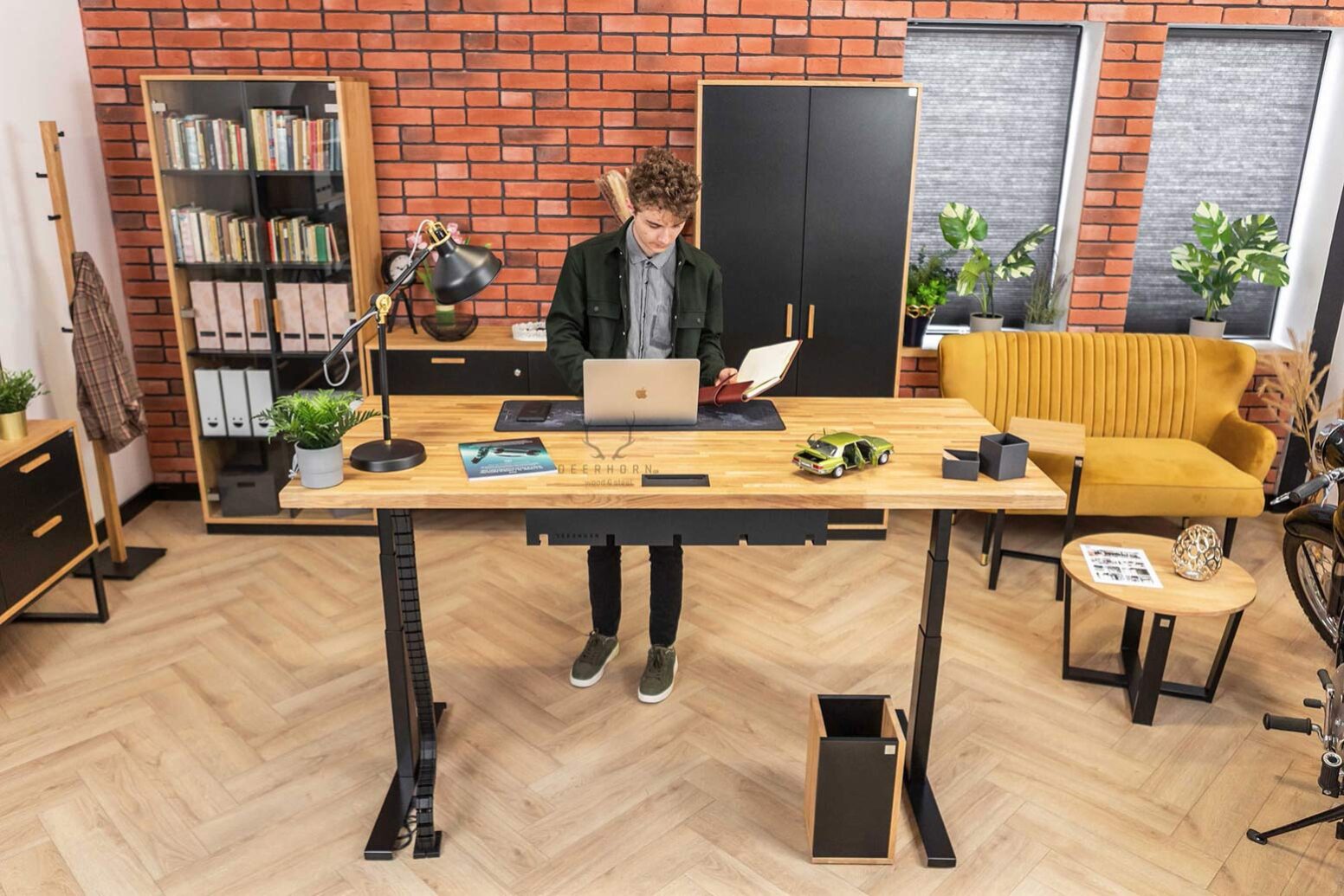 desk-lift person standing at a desk