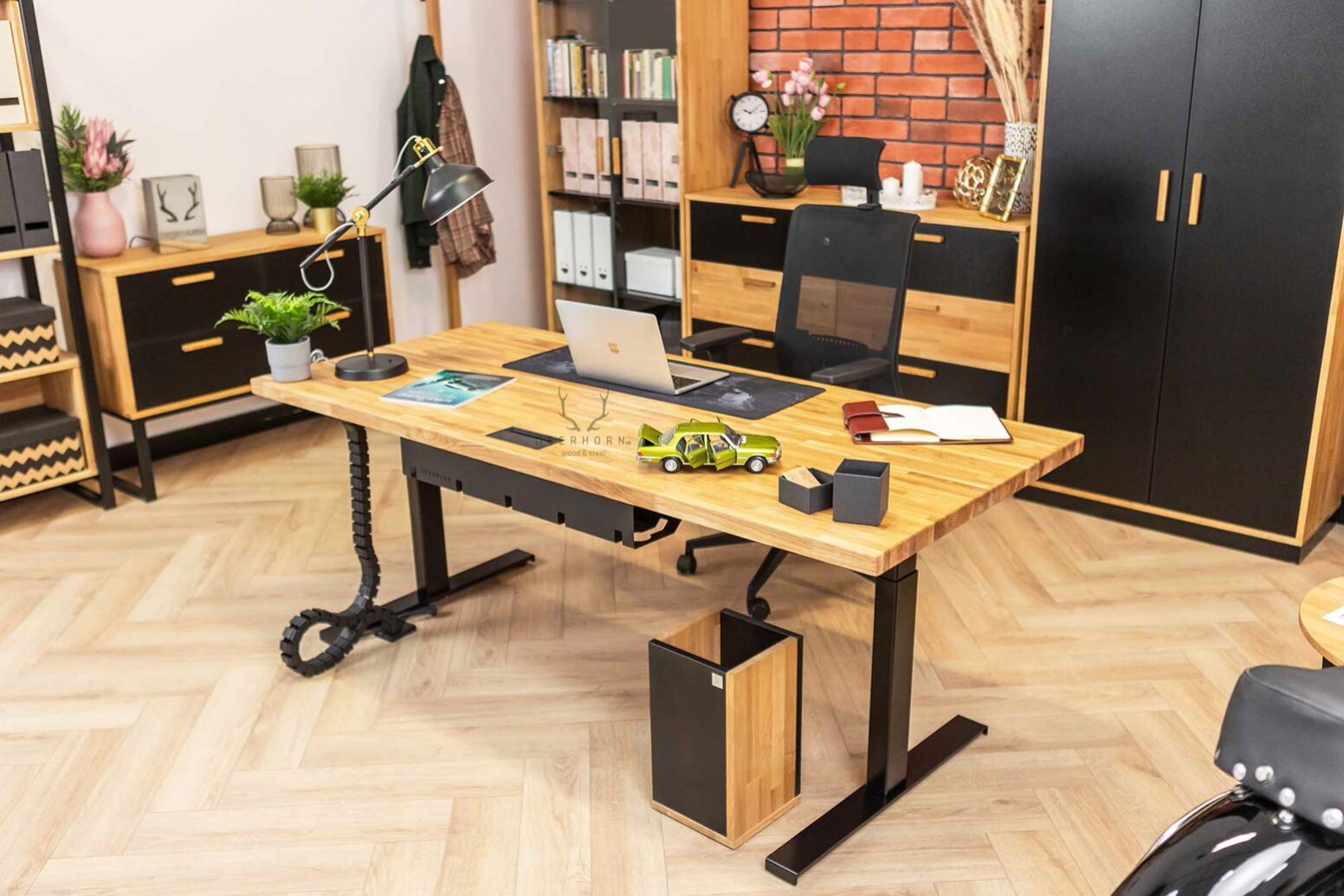 desk-with-changing-position-work desk standing in front of other furniture