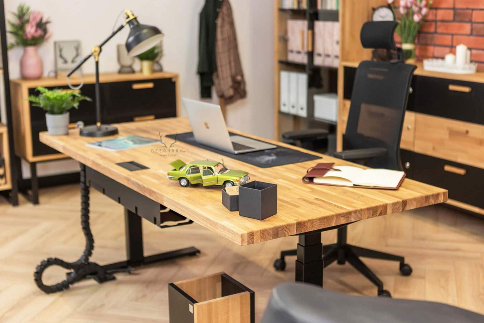 rack-electrically-adjustable desk with a thick wooden top