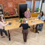 conference room table with electric height adjustment