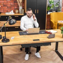 desk with a large top on metal legs