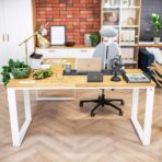 desk in the middle of the office