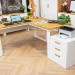 white corner desk with wooden top and three-drawer pedestal