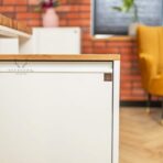 white pedestal with aluminum handle
