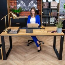 office desk with black frame and wooden top