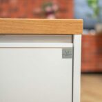 white pedestal with wooden top