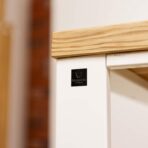 desk with white frame and wooden top