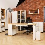 wide white desk with wastebasket