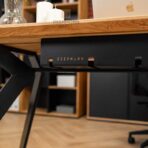 desk with a thoughtful system for cables