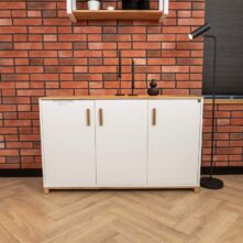 white wide chest of drawers with wooden handles and wooden body