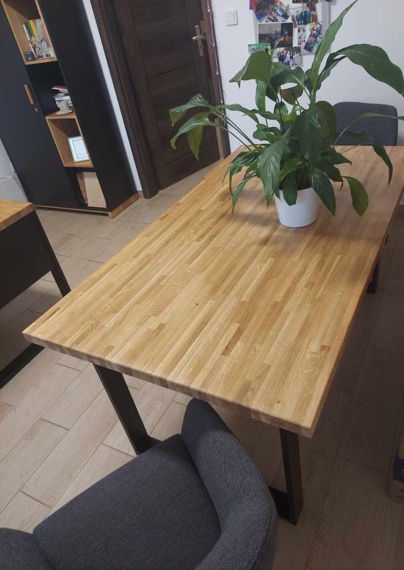 table with wooden top on metal black legs