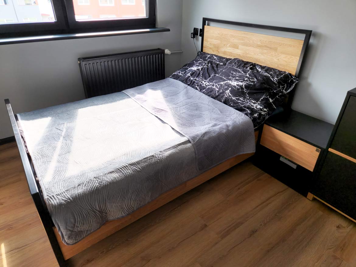 wood and metal bedroom bed