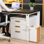 white desk with drawers and white pedestal