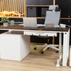 white desk with white filing cabinet