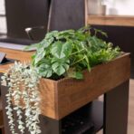 desk with flowerbed for plants