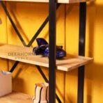 minimalist bookcase with wooden shelves