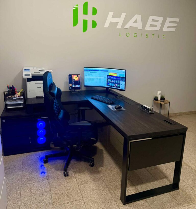 Unique corner desk in ebony color for transportation company HABE Logistic