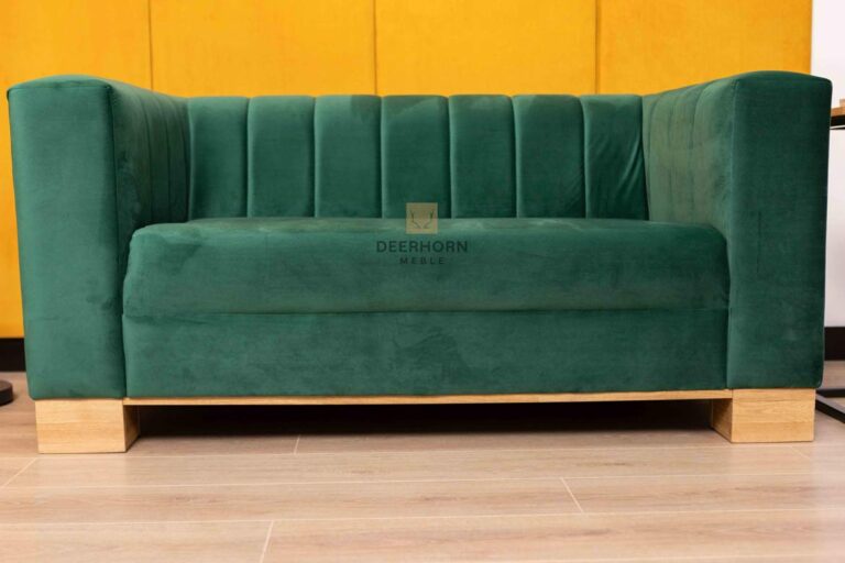 bottle-green sofa upholstered in soft velour