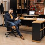 industrial style desk with brick back wall