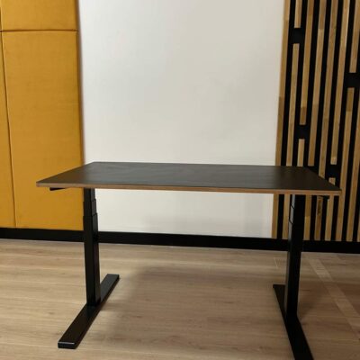 Electric standing desk with black top