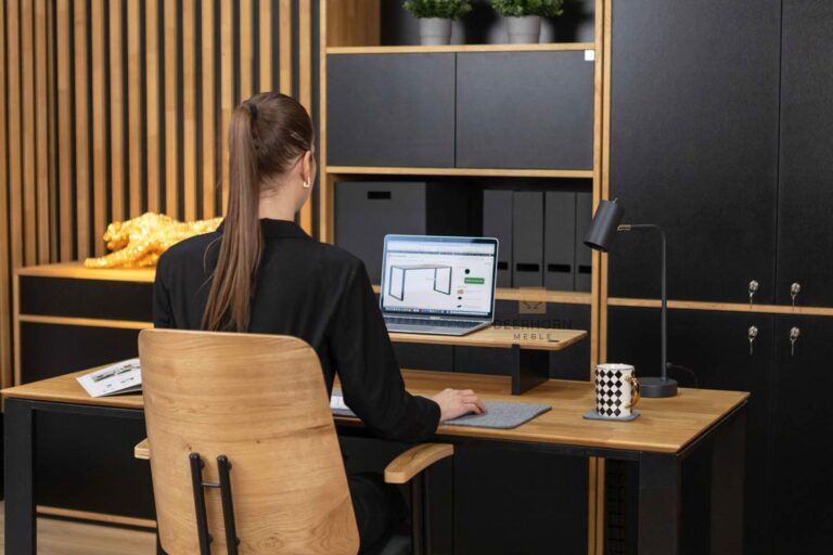 desk with laptop and lamp