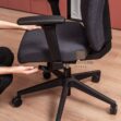 Swivel chair with adjustable headrest and armrests