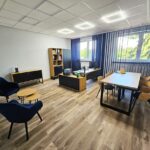office with a corner for guests