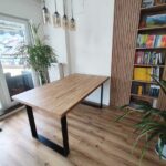 wooden table with black legs