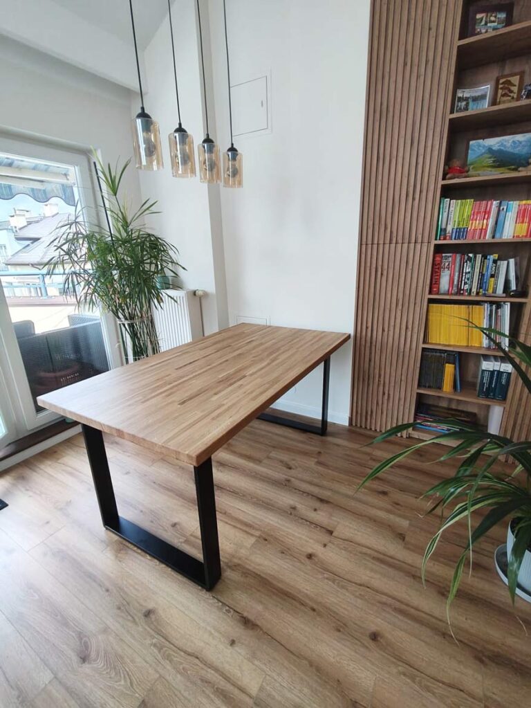 wooden table with black legs