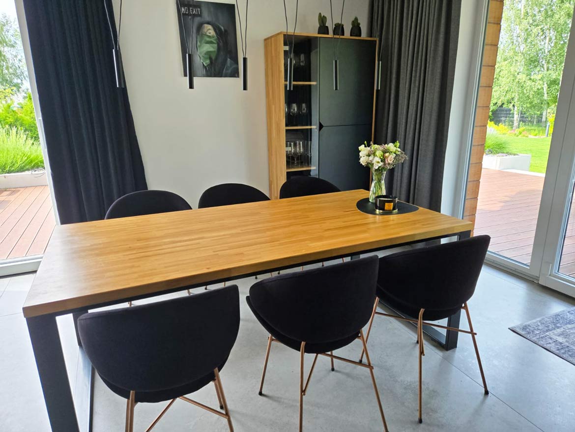 Deerhorn loft table in a modern dining room near Kraków, Poland