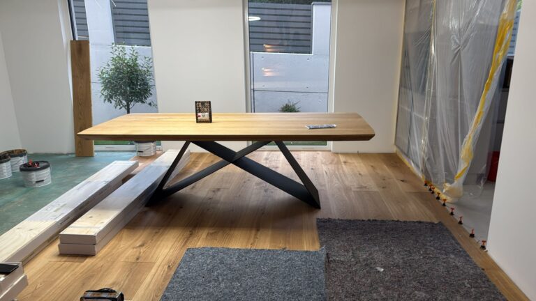 Large table with thick oak top on a metal base