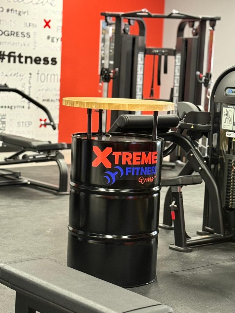 Barrel table for gym chain from Deerhorn