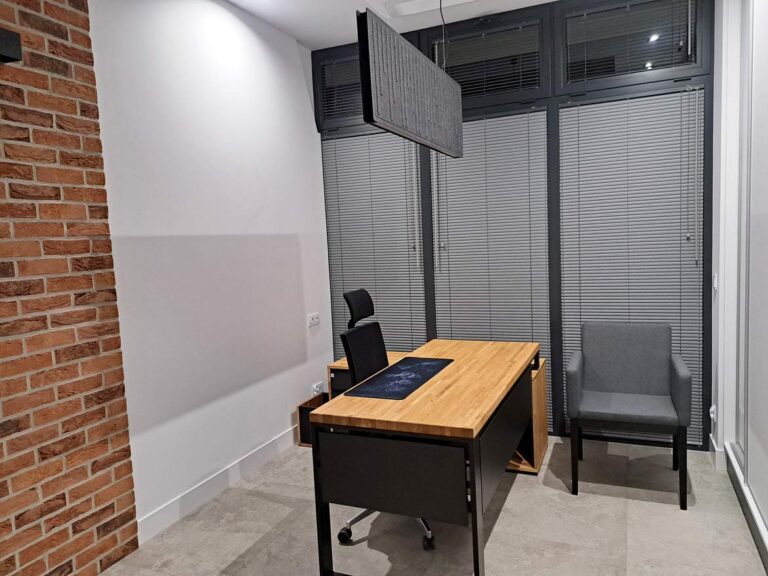 open space office with brick