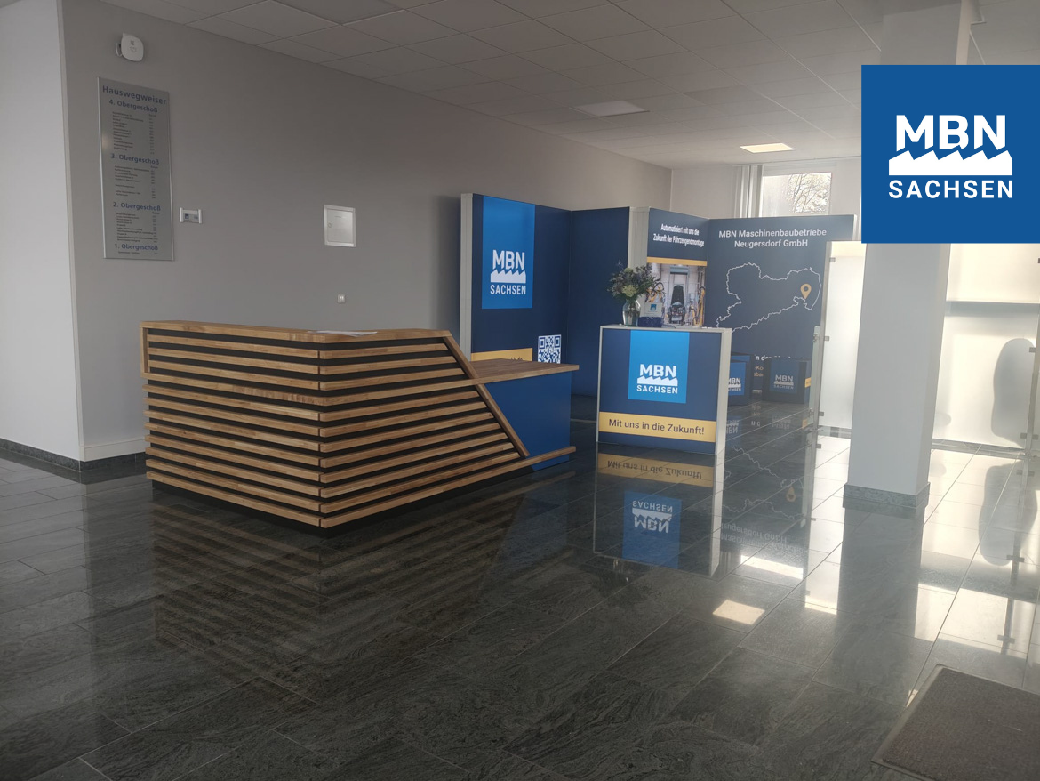 Blue reception desk for MBN Maschinenbaubetriebe Neugersdorf GmbH (Germany)