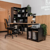 set of modern office furniture in imitation wood and black