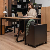 sturdy office desk with cable grommet and cable organization