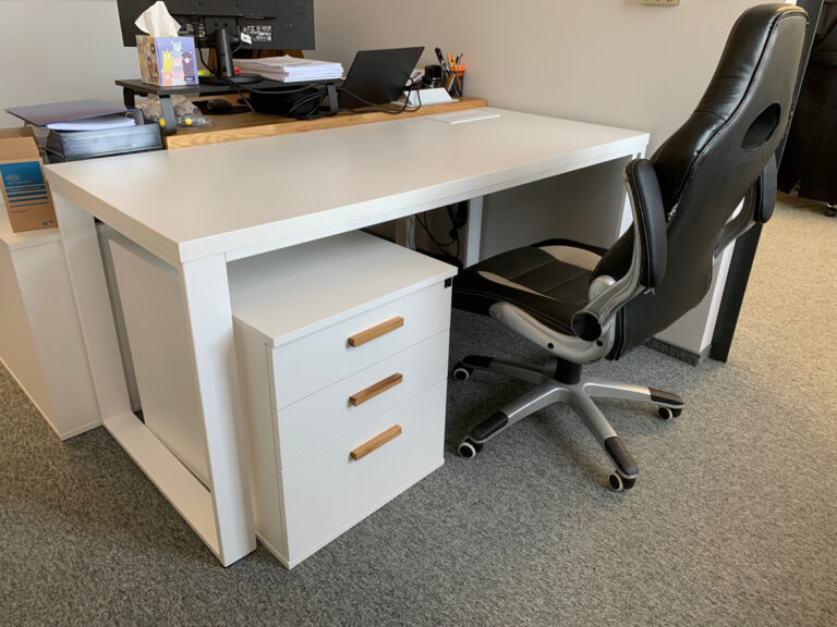 Furnishing the office with white furniture with capacious pedestals for the company Bioceltix S.A.