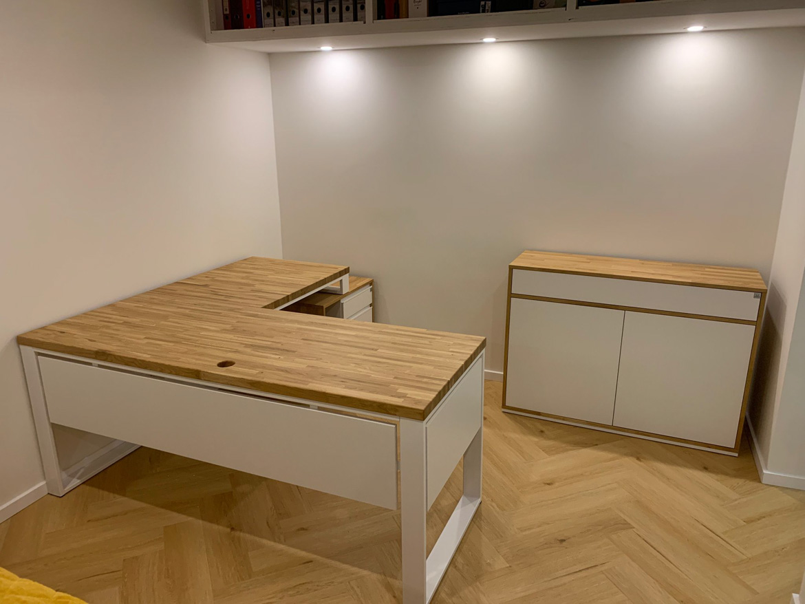 White corner desk for a small office for a client from Berlin