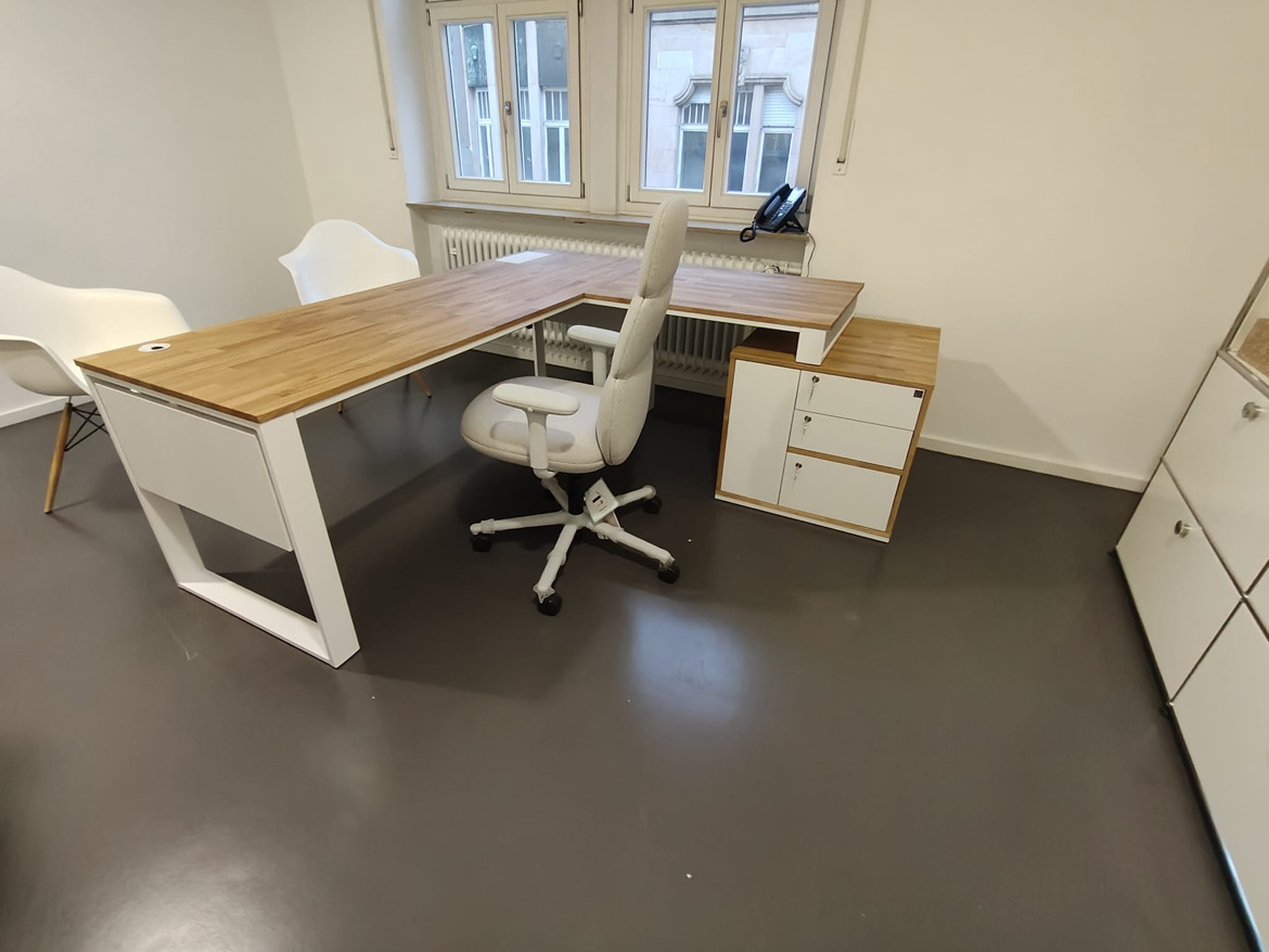 White corner desk with pedestal for medical office in Stuttgart