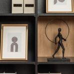 black bookcase with wood-like elements