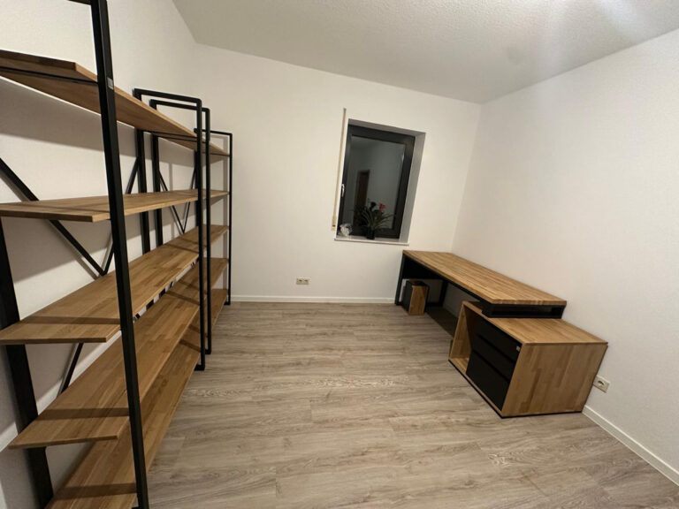 Office with shelving and desk for a client from Germany