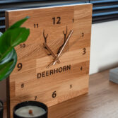 a clock that can be placed on a surface or hung on the wall
