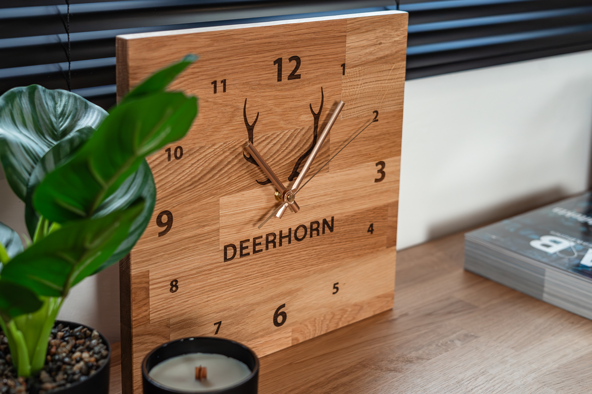 stand-or-hang-clock a clock that can be placed on a surface or hung on the wall