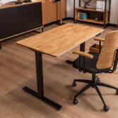 Standing work at an adjustable desk in an elegant office space
