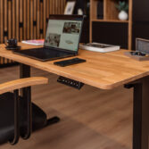 Loft-style desk with a wooden top and metal frame for a modern office