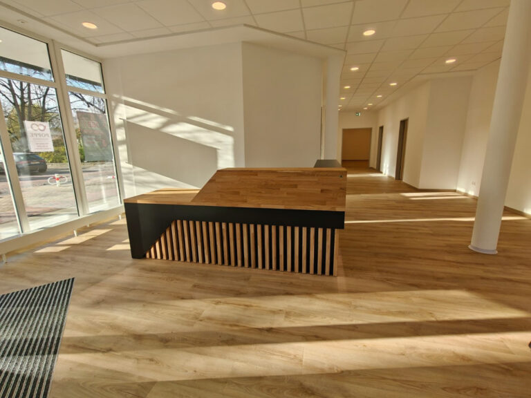 Reception counter for Poppe Bestattungen in Neustadt, Germany.