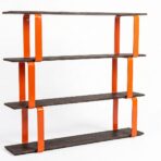 Asymmetrical orange bookcase for the office